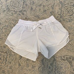 White Lululemon athletic her shorts, size 6